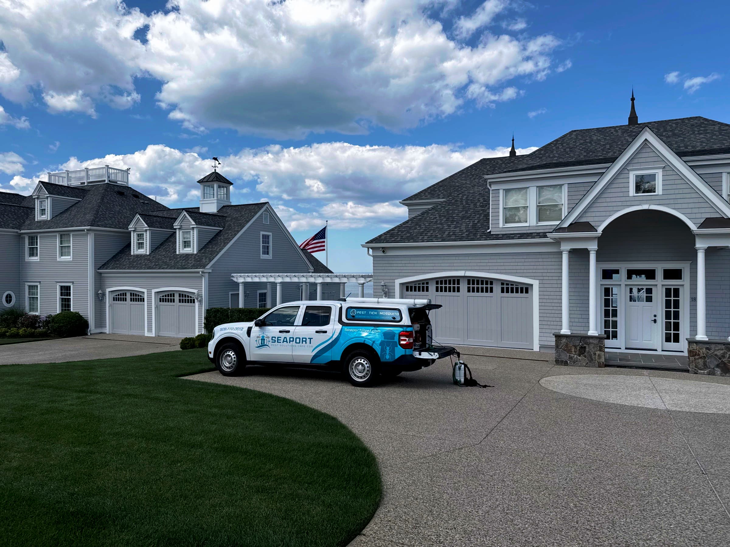 Seaport Pest Solutions service truck at a Connecticut home